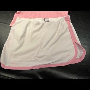 Nike Women’s Tennis Skort. White with pink trim. Top not included with skirt.MED